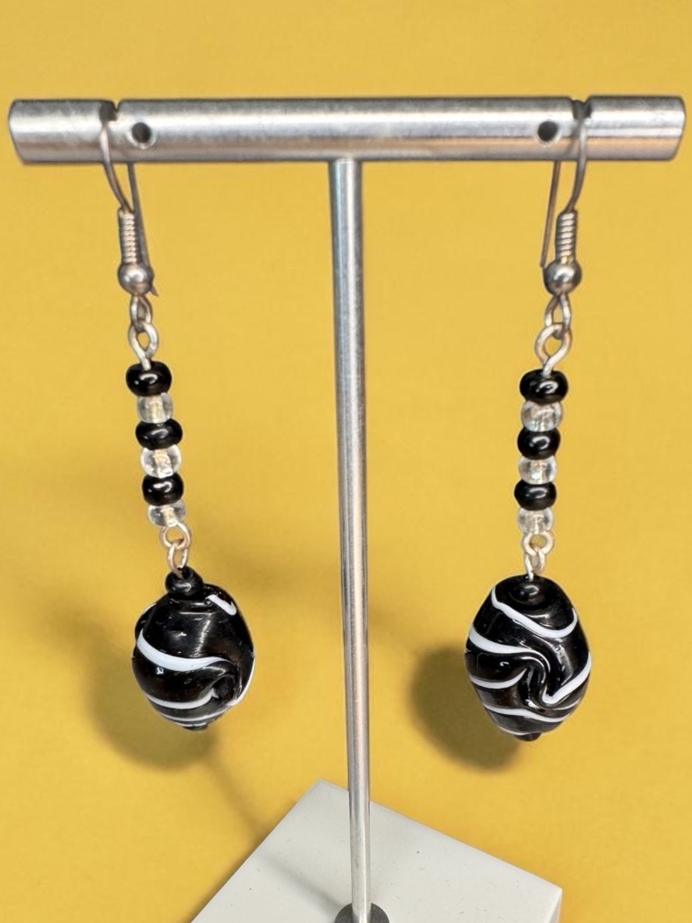Black and White Swirl Bead Dangle Earrings - SKU A